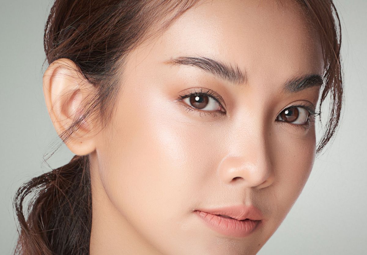 Close-up portrait of a woman with natural beauty.
